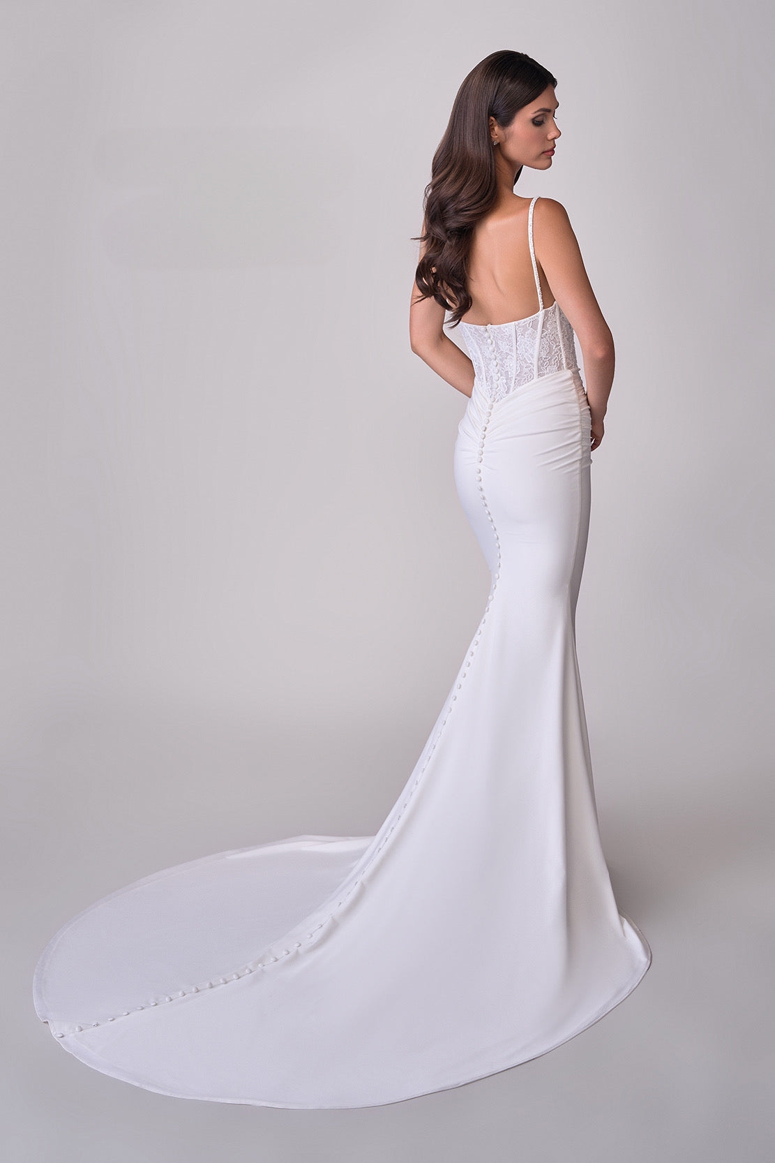 Joelle Olivia by La Femme J2172 Mabel Bridal Gown - Luxe jersey wedding dress with lace corset top and a sweeping train. Ideal for bridal occasions.