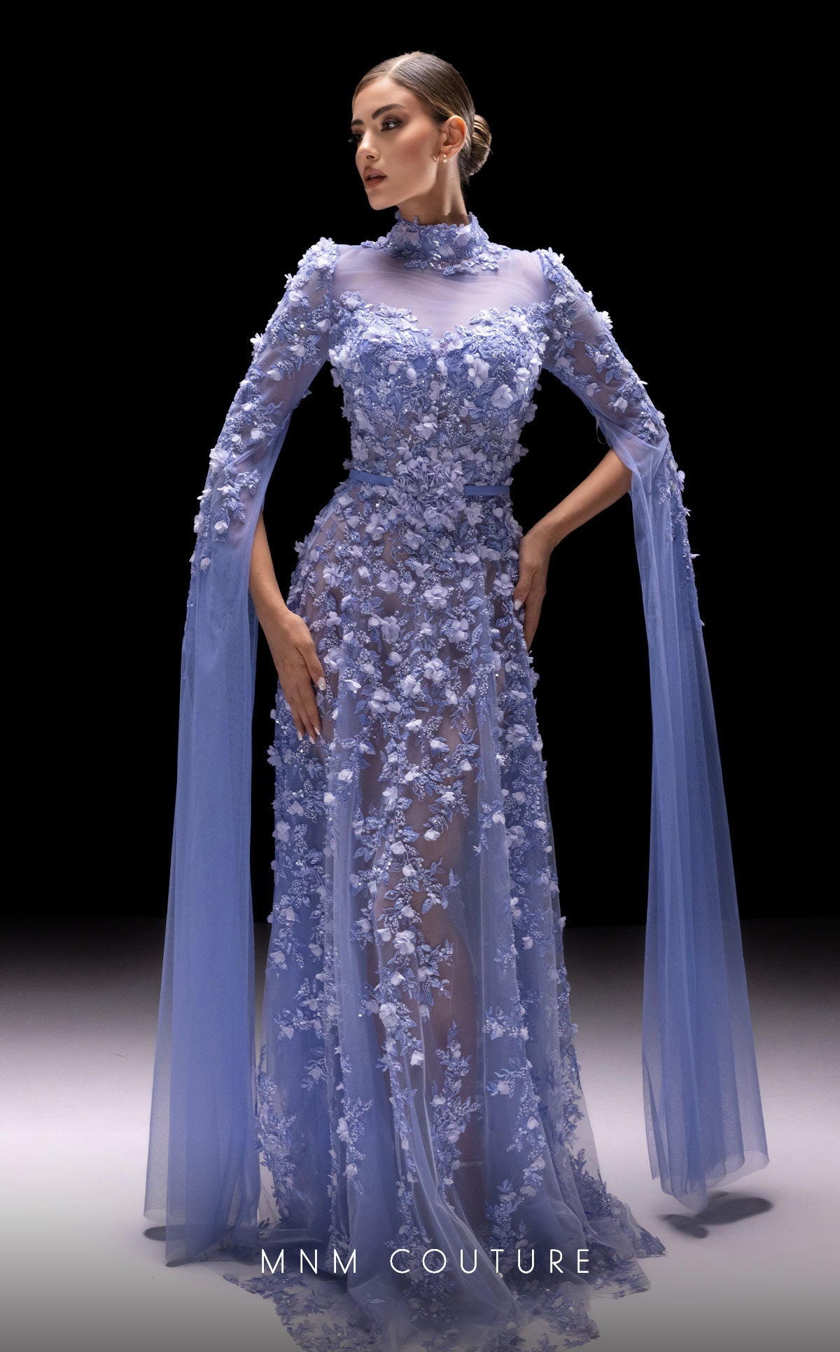 MNM COUTURE - K4236 - Embroidered Sheer Cape Sleeve Gown Madeline's Boutique Boca Raton MNM COUTURE - K4236 - Embroidered Sheer Cape Sleeve Gown Madeline's Boutique Boca Raton