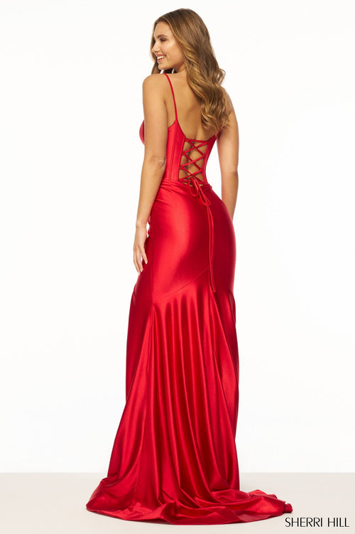 Sherri Hill 56158 - An alluring stretched satin gown with a corset bodice, deep V neckline, and skirt slit, perfect for a bold and elegant prom look.