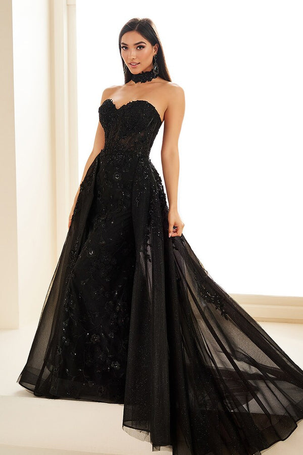 Ellie Wilde EW36028 Corset Gown with Detachable Train & Choker - Elegant prom gown featuring a corset bodice, choker, three-dimensional flowers, and a detachable train.  Model is wearing the dress in the color black.