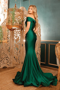 Experience timeless glamour with this Jessica Angel gown from Madeline's. Style number 721 features an off-the-shoulder silhouette, cap sleeves, and a subtle V neckline. Made from luxurious Silk Jersey fabric, this dress offers comfort and elegance. Perfect for prom and evening special occasions. Shop now at Madeline's in Toronto, Canada, and Boca Raton, Florida.