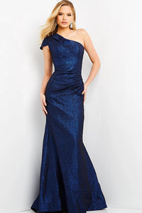 Shop the stunning Jovani 06751 Fitted One Shoulder Mermaid Dress at Madeline's Boutique in Toronto, Canada, and Boca Raton, Florida. Perfect for evening occasions and Mother of the Bride/Groom. Embrace elegance and style with this metallic jacquard masterpiece.