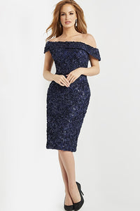 Shop this stunning navy floral embroidered cocktail dress by Jovani, available at Madeline's Boutique in Toronto, Canada and Boca Raton, Florida. This off-the-shoulder knee-length dress features a form-fitting silhouette and a fold-over straight neckline. Made from delicate lace with ribbon details, it's perfect for any special occasion, including weddings and black tie events