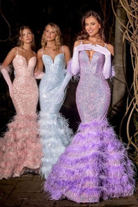 The Portia & Scarlett Sequin and Pearl Mermaid Gown with Tiered Feathered Hem, a statement of elegance and sophistication for proms, formal events, and red carpet affairs.