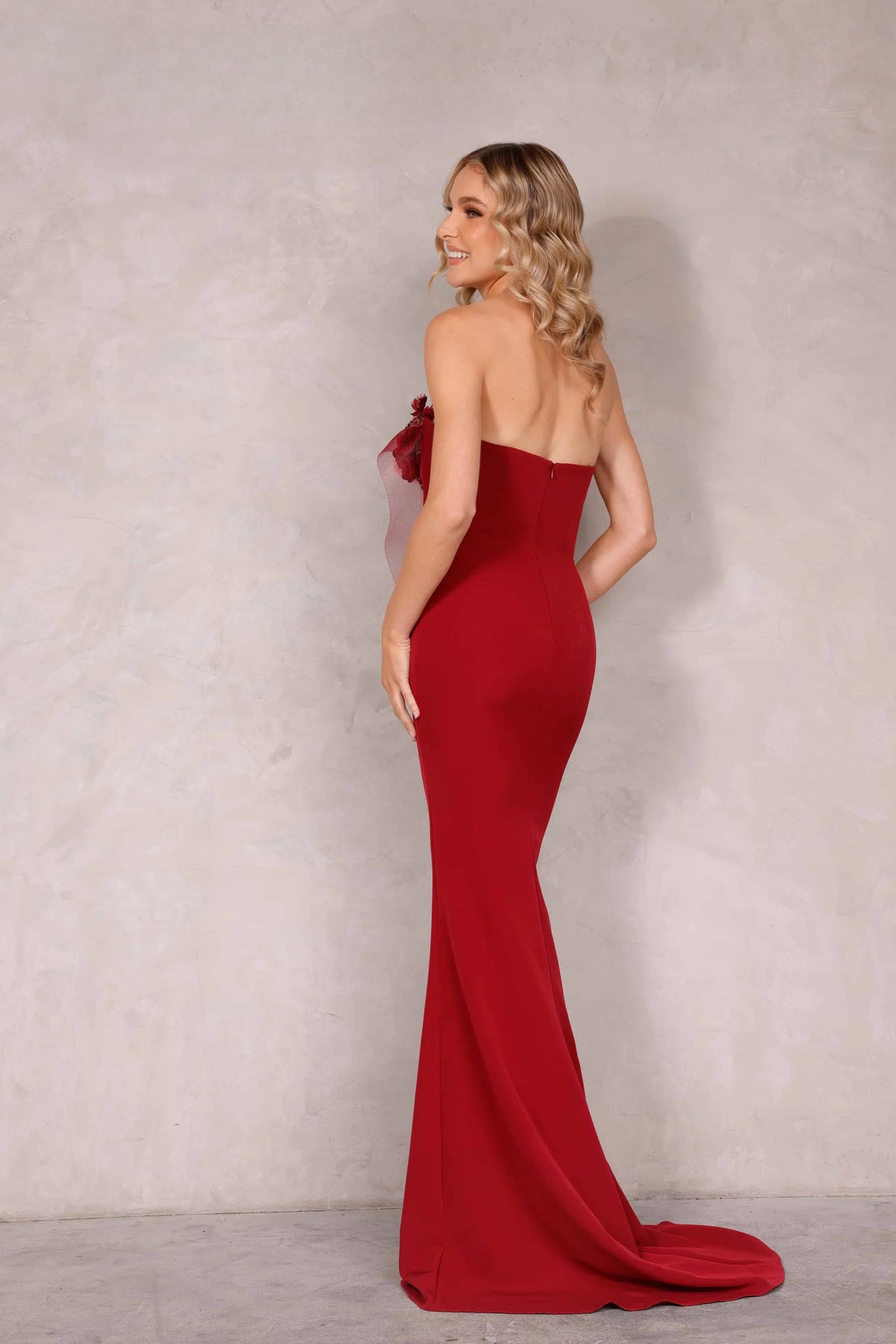 Gorgeous strapless column dress by Terani Couture, style number 2021E2818, adorned with sculpted horsehair and 3D flowers. Available at Madeline's in Toronto, Canada, and Boca Raton, Florida.