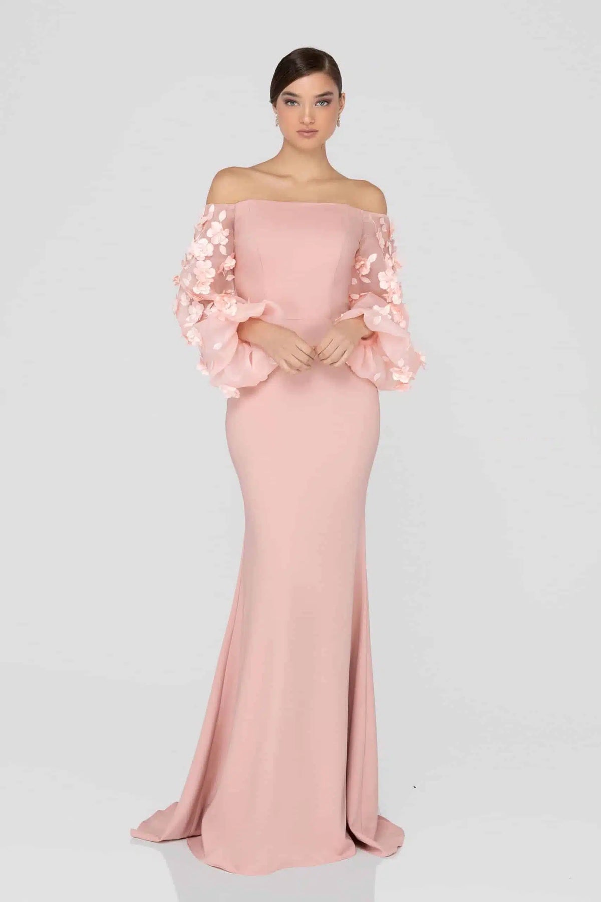 Terani Couture 1911E9128 Off Shoulder Floral Accent Puff Sleeves Gown in 2 Way Stretch Satin, perfect for mother of the bride or groom. Adorned with 3D flowers on organza sleeves.  Dresses color is Blush.