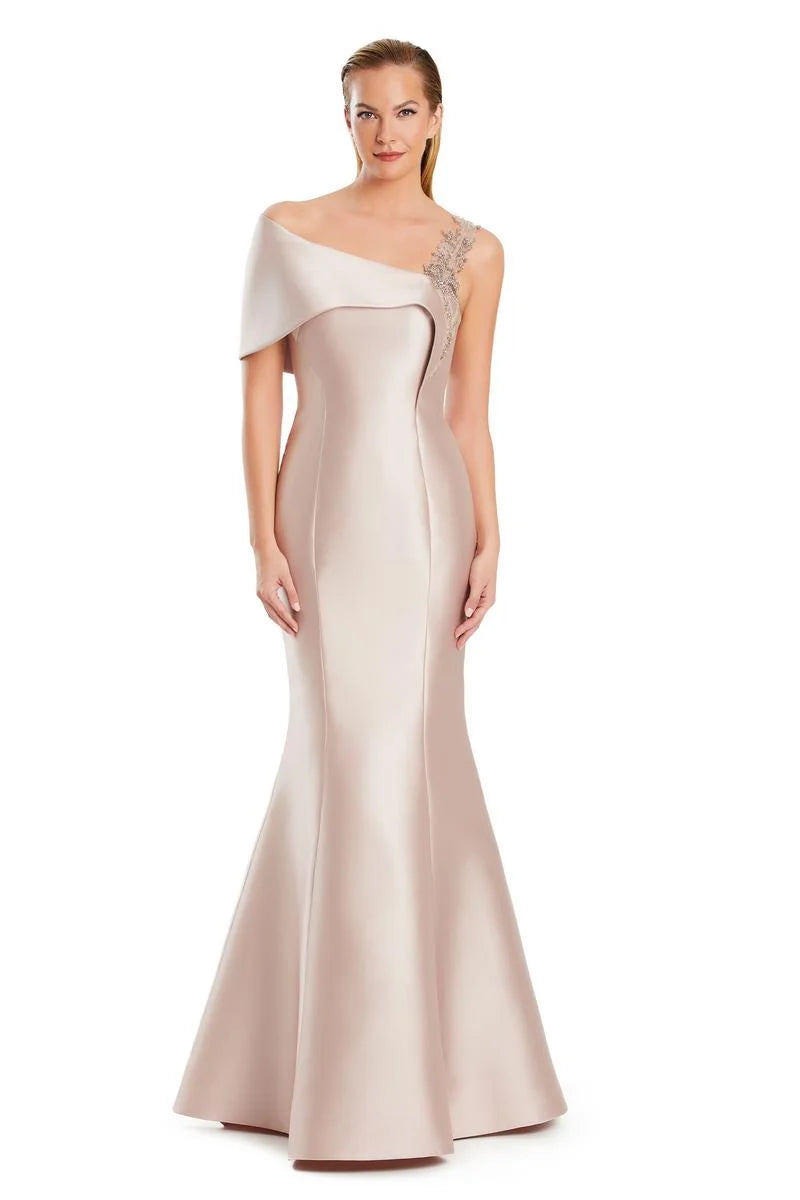 Model wearing Alexander by Daymor 3060S25 one-shoulder gown with draped back detail, fitted silhouette, and floor-length skirt.