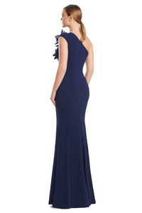 MIDNITE COLOR evening gown with ruffled shoulder on a white background.  Back view