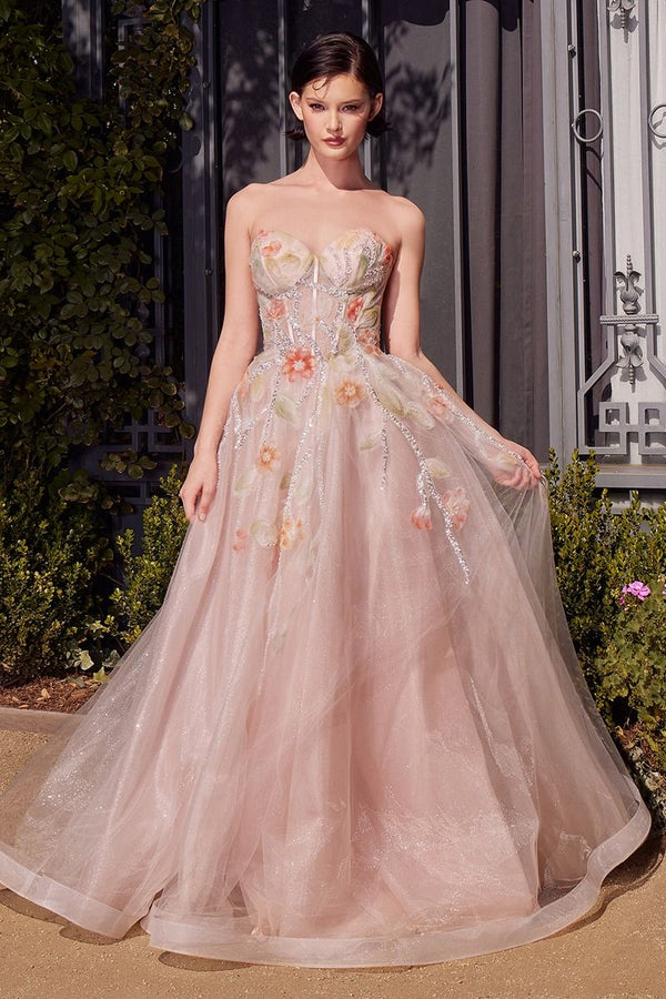 Andrea & Leo A1383 strapless ballgown in peach with a sweetheart neckline, sheer bodice, and watercolor floral appliqués, perfect for prom and formal events.