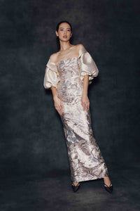 Audrey+Brooks 7136 strapless gown with draped bodice, contrast cover up, statement sleeves and sheath skirt silhouette.