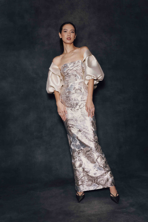 Audrey+Brooks 7136 strapless gown with draped bodice, contrast cover up, statement sleeves and sheath skirt silhouette.