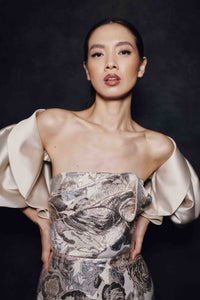 Audrey+Brooks 7136 strapless gown with draped bodice, contrast cover up, statement sleeves and sheath skirt silhouette.