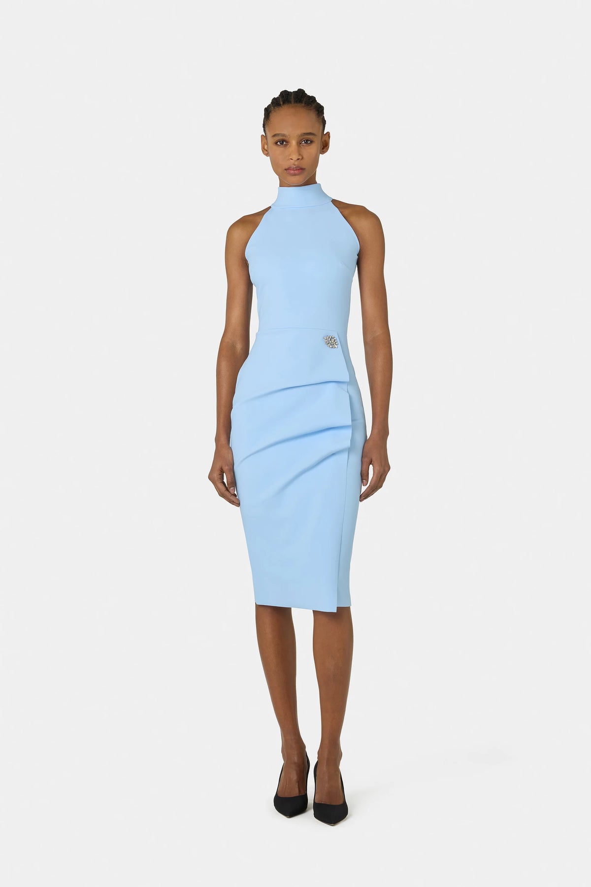 Light blue dress worn by a model on a white background