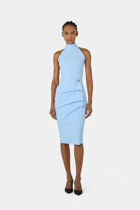 Light blue dress worn by a model on a white background