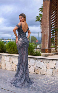 Chic & Holland HF885A Beaded Off-Shoulder Gown featuring intricate beadwork, a form-fitting silhouette, an open back, and a floor-length train.