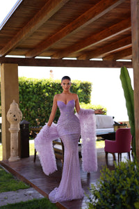 Model wearing Chic & Holland PH120111 strapless fully beaded mermaid gown with sculpted silhouette and matching statement stole.