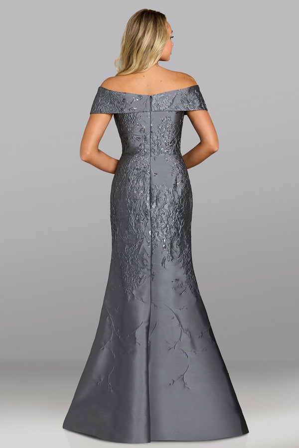Model wearing Feriani Couture 18607 off-the-shoulder fitted gown with a structured bodice and floor-length silhouette.