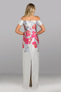 Model wearing Feriani Couture 18623 off-the-shoulder column gown with floral bodice detailing and a sleek, floor-length silhouette.