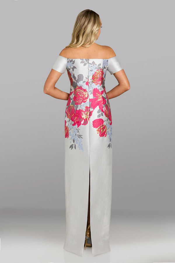 Model wearing Feriani Couture 18623 off-the-shoulder column gown with floral bodice detailing and a sleek, floor-length silhouette.