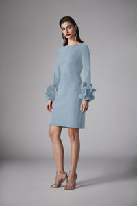 Model wearing Frascara 4525 dress with long sleeves, A-line silhouette, and 3D floral embellishments at the cuffs.