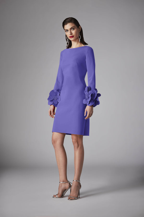 Model wearing Frascara 4525 dress with long sleeves, A-line silhouette, and 3D floral embellishments at the cuffs.