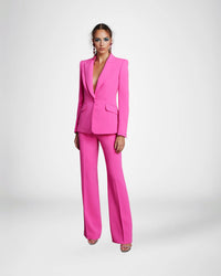Frascara 4620 - An elegant pantsuit featuring a single-breasted jacket and wide-leg pants, perfect for formal evening occasions. The model is wearing the pantsuit in the hot pink.  Front view..