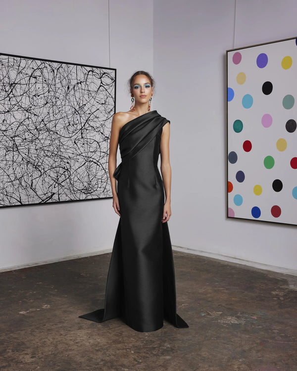 Frascara 4628 - An elegant off-the-shoulder evening gown with a draped bodice, back bow, and train, perfect for formal evenings and mother of the bride or groom occasions.  The model is wearing the dress in black.