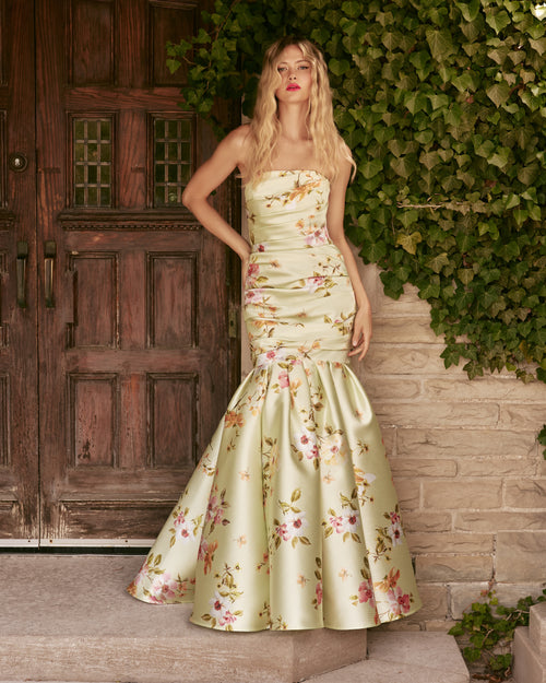 Model wearing Frascara 5064 strapless draped mermaid gown with fitted bodice and flared skirt silhouette in the color mint green.  Front View.