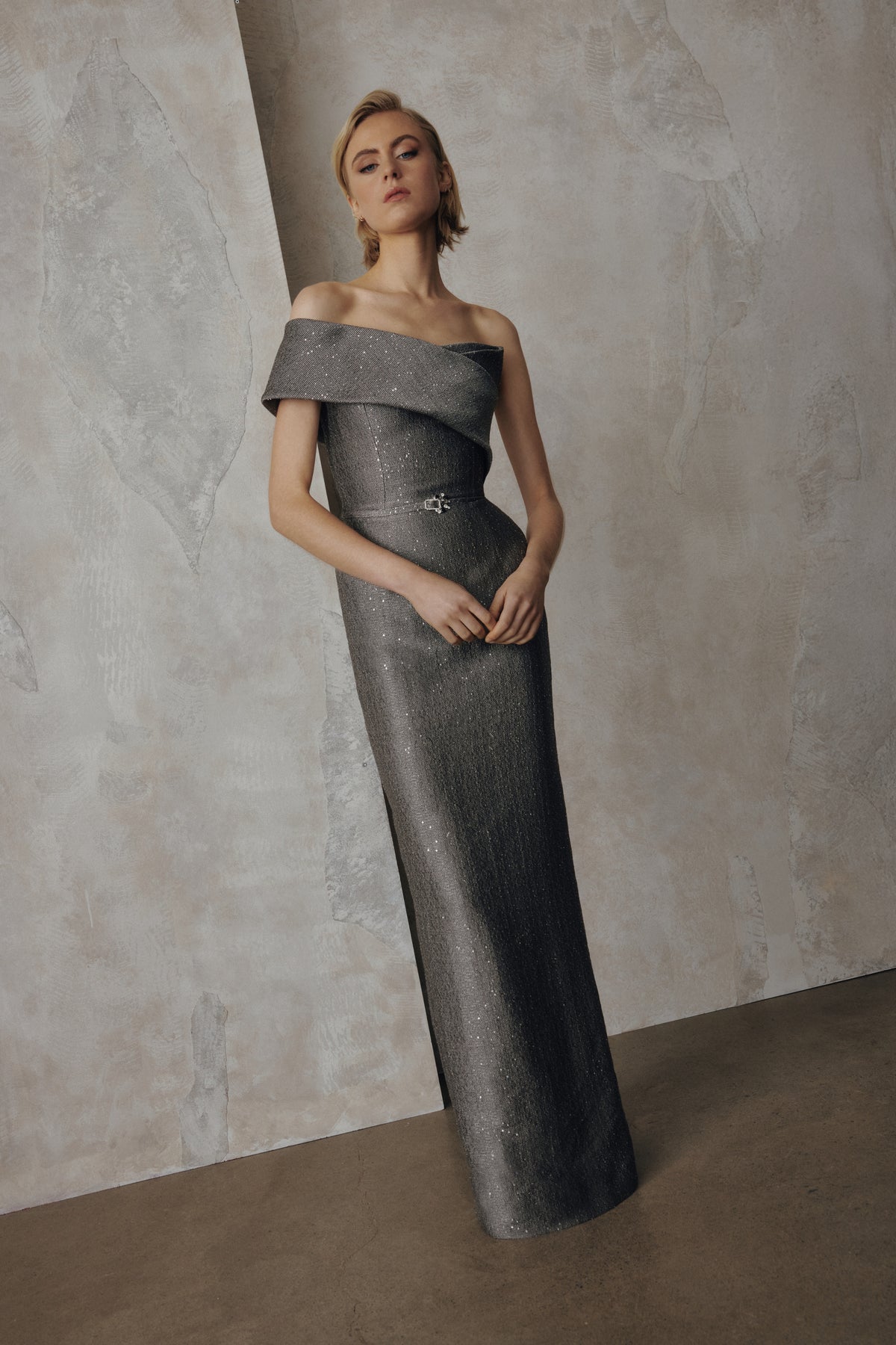 Frascara 5136 off-the-shoulder gown with asymmetrical collar, rhinestone buckle belt, column skirt and back vent.