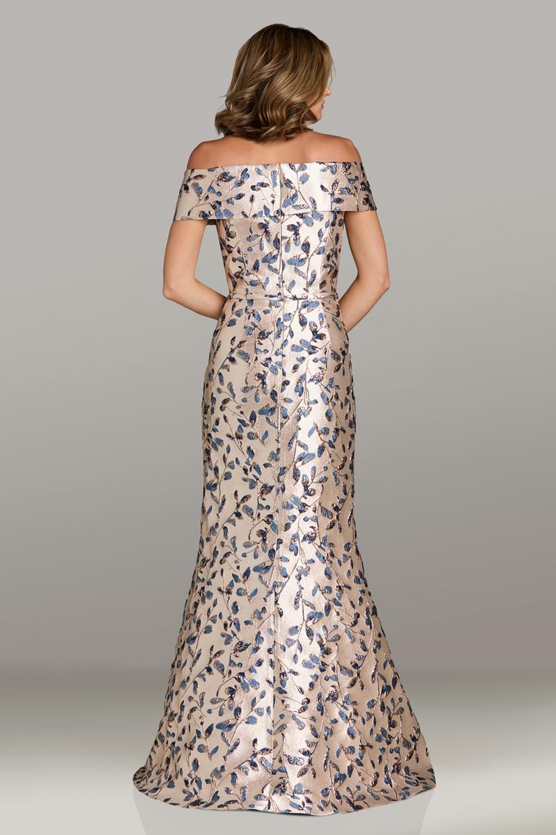 Model wearing Gia Franco 12500 off-the-shoulder brocade evening gown with fitted silhouette and floral pattern.  Back view of the Dress.