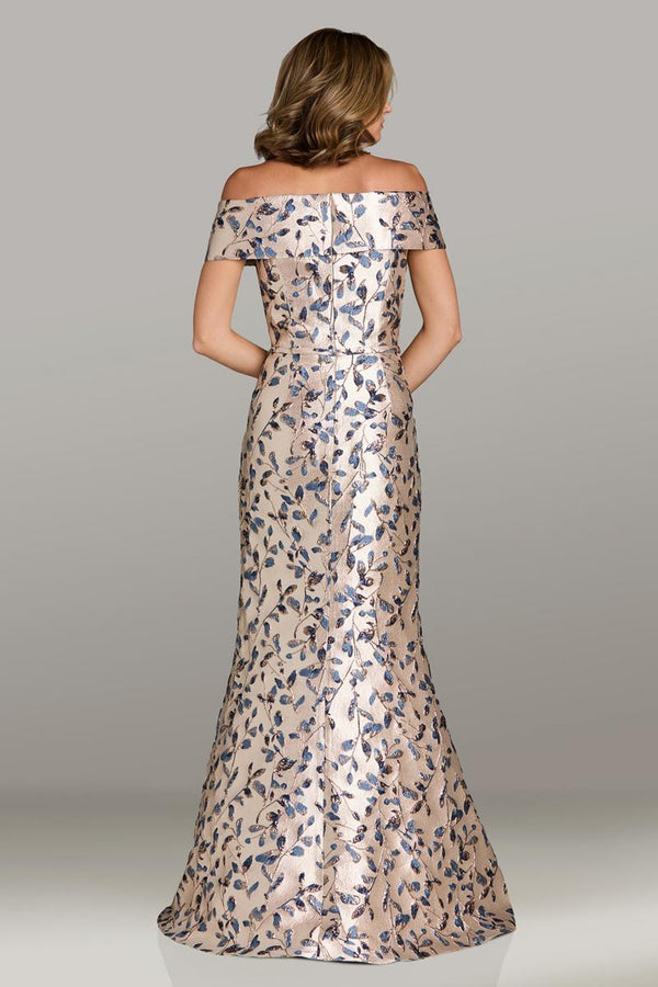 Model wearing Gia Franco 12500 off-the-shoulder brocade evening gown with fitted silhouette and floral pattern.  Back view of the Dress.