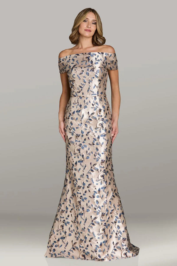 Model wearing Gia Franco 12500 off-the-shoulder brocade evening gown with fitted silhouette and floral pattern.