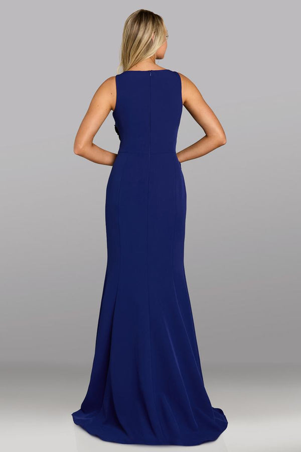 Model wearing Gia Franco 12645 sleeveless column gown with floral appliqué detailing and elegant fitted silhouette.