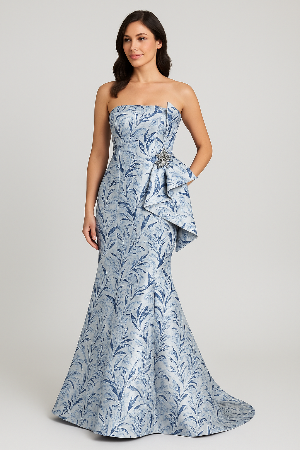 Model wearing Gia Franco 18507 strapless jacquard gown with swirl pattern and side ruffle detail.