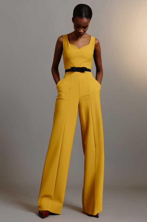 Model wearing Greta Constantine Winslet jumpsuit featuring a sweetheart neckline, fitted waist, and wide-leg pants.