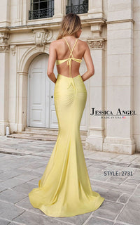 Jessica Angel 2731 mermaid gown featuring a plunging V-neckline, side cutouts, ruched waist, open tie-back design, and flared skirt.