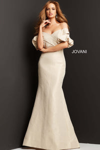 Model wearing Jovani 06831 off-the-shoulder puff sleeve mermaid gown with crossover bodice.