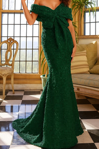 Model wearing Jovani 09768 lace appliqué mermaid gown with sweetheart neckline, matching shawl, and dramatic flared hem.  Model is wearing the color Emerald.