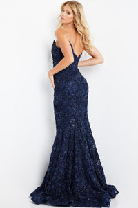 Model wearing Jovani 09768 lace appliqué mermaid gown with sweetheart neckline, matching shawl, and dramatic flared hem.  Model is wearing the color Navy Back View.