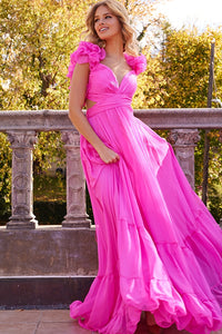 A glamorous one-shoulder evening gown with a sequinned bodice, long feather sleeve, and floor-length silhouette. Perfect for evening events, red carpet occasions, and pageants.  Picture is of model wearing the dress in Hot Pink.