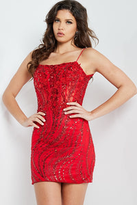 A stunning sleeveless cocktail dress by Jovani, featuring delicate spaghetti straps, intricate embroidery, and glitter detailing, perfect for special evening occasions, homecoming, and parties. Picture is of model wearing 26183 in Red. Available at Madeline's Boutique in Boca Raton, Florida and Toronto, Ontario, Canada.
