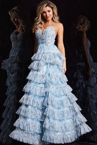 The Jovani Floral Print A-line Gown, a captivating ensemble with a pleated bodice, V-neckline, and a playful ruffle skirt, perfect for proms and formal occasions. This a picture of the dress in light blue.
