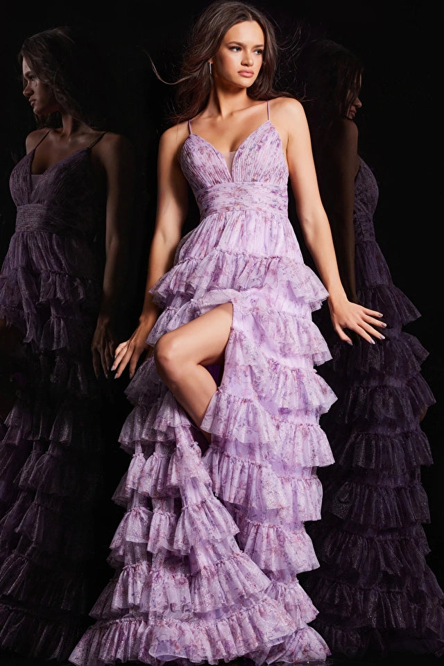 The Jovani Floral Print A-line Gown, a captivating ensemble with a pleated bodice, V-neckline, and a playful ruffle skirt, perfect for proms and formal occasions. This a picture of the dress in lilac.
