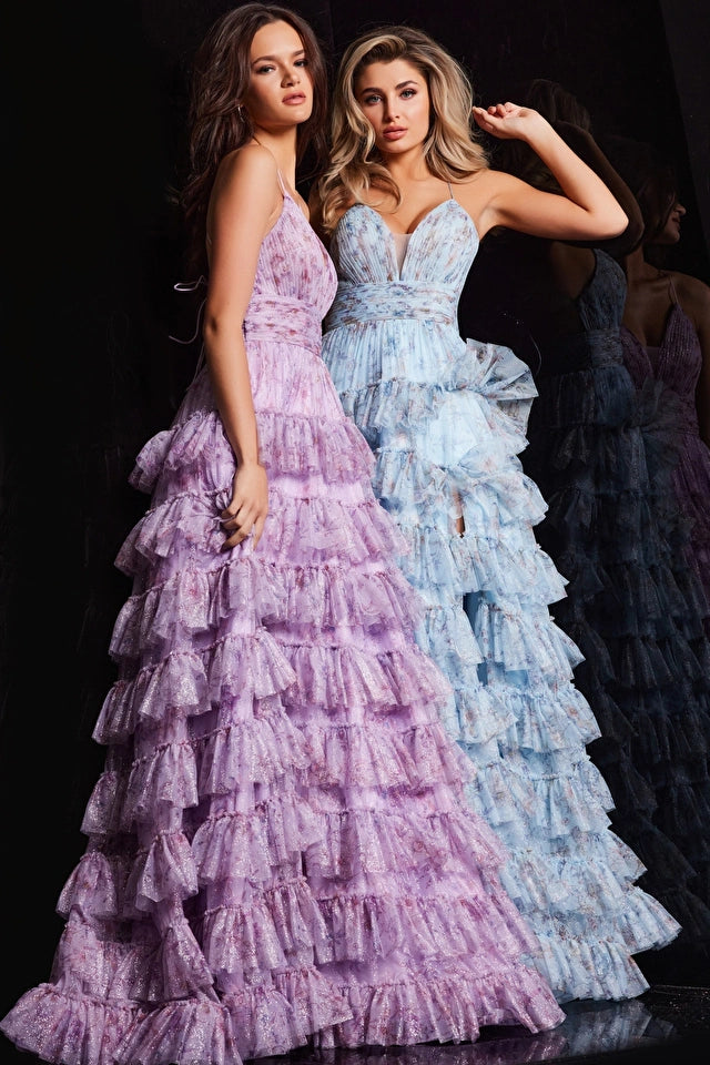 The Jovani Floral Print A-line Gown, a captivating ensemble with a pleated bodice, V-neckline, and a playful ruffle skirt, perfect for proms and formal occasions. This a picture of the dress in lilac and light blue.