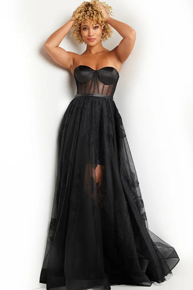 Jovani 37646 Illusion Bodice Lace Applique Prom Gown - A sophisticated gown featuring a high waist, lace appliques on the skirt, short underskirt, satin belt and bust, and an illusion bodice with boning and sweetheart neckline.  The model is wearing the dress in Black.