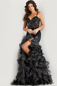 Jovani 38358 Sequin Embellished Mermaid Evening Gown - A glamorous gown featuring an organza ruffle skirt with a slit, sequin embellished bodice with boning and illusion waist, and a mermaid silhouette with a sweetheart neckline.  The model is showcasing the dress in black.