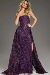 Model wearing Jovani 39029 strapless A-line gown with sequin embellishments and flowing overlay.