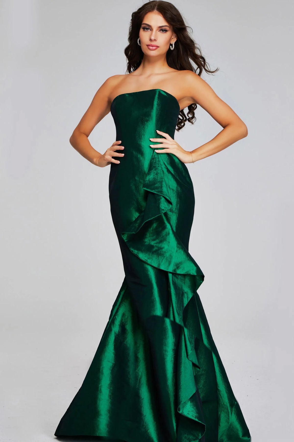 Model wearing Jovani 39368 strapless evening gown with cascading ruffle and fitted silhouette.