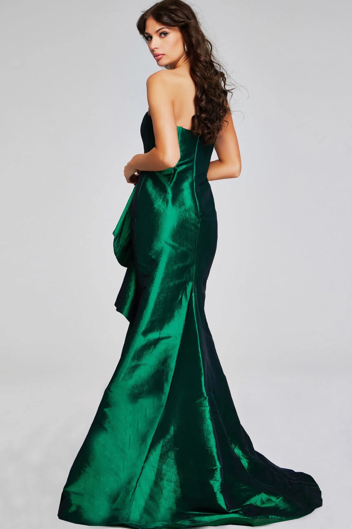 Model wearing Jovani 39368 strapless evening gown with cascading ruffle and fitted silhouette.