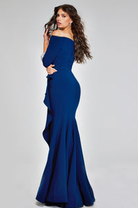 Model wearing Jovani 42409 off-the-shoulder gown with three-quarter sleeves, embellished cuffs, and draped side detail.